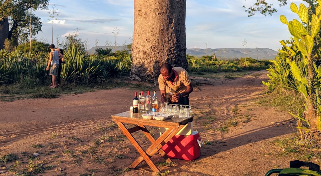 Sundowner cocktail hour next to the Baobabs in Mandrare